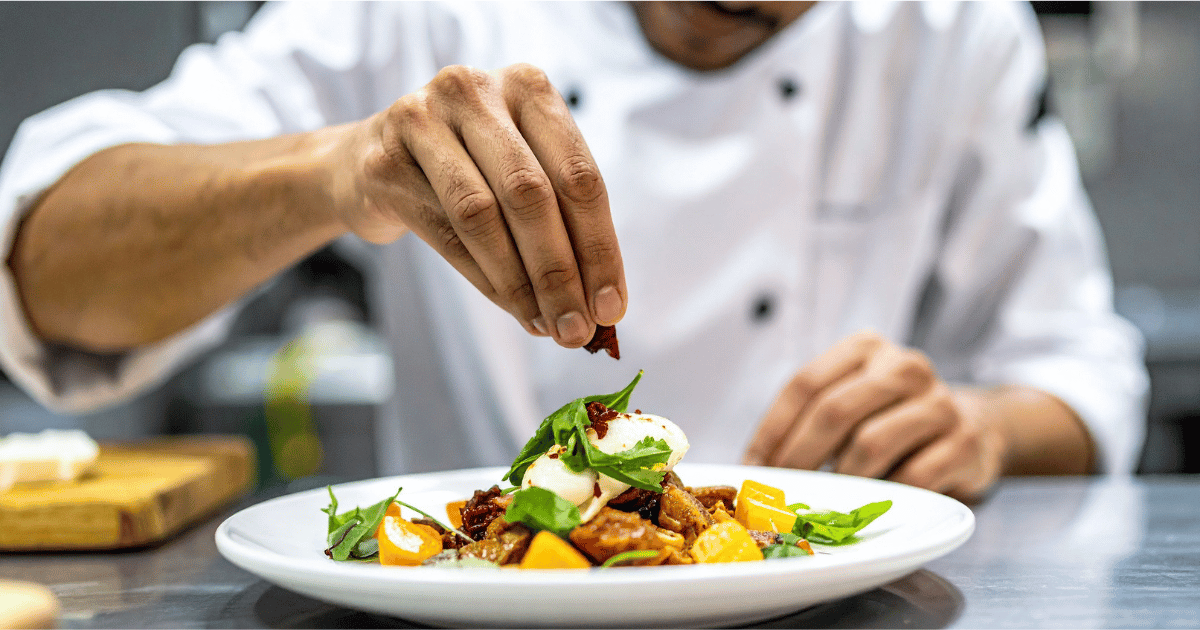 Chef cooking in a commercial kitchen